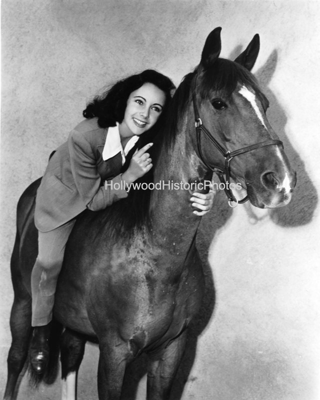 Liz Taylor on her horse at MGM Studios copy.jpg